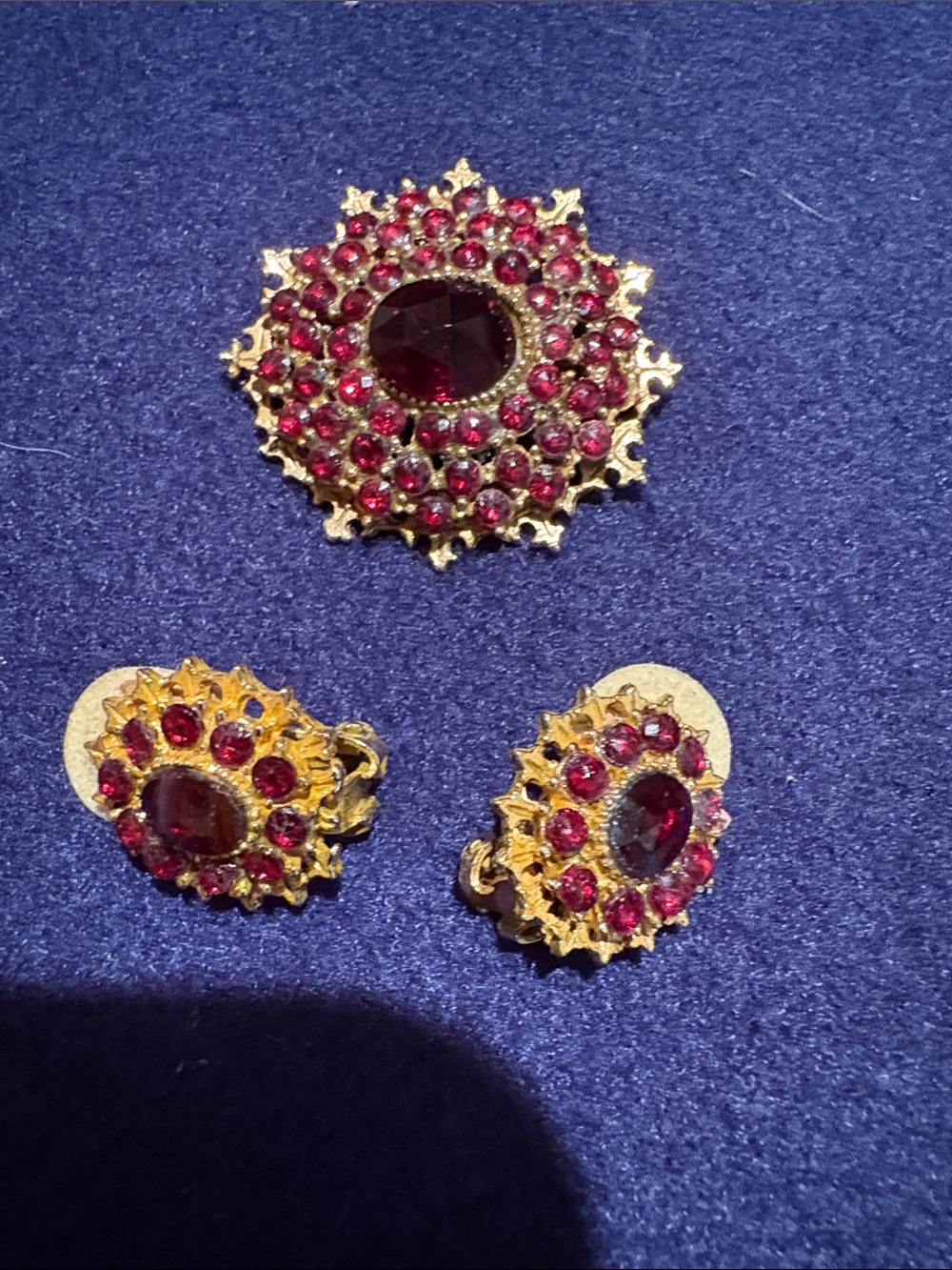 Vintage-Inspired Gold Tone Brooch and Clip Earrings Set with Red Stones